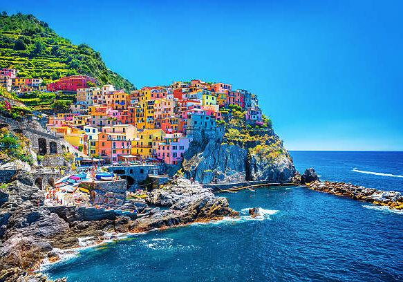 Beautiful colorful cityscape on the mountains over Mediterranean sea, Europe, Cinque Terre, traditional Italian architecture